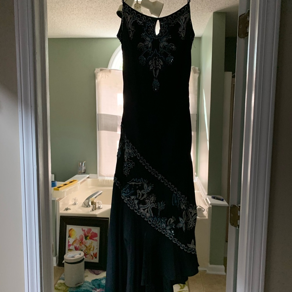Black CACHE dress with beautiful beading detail;